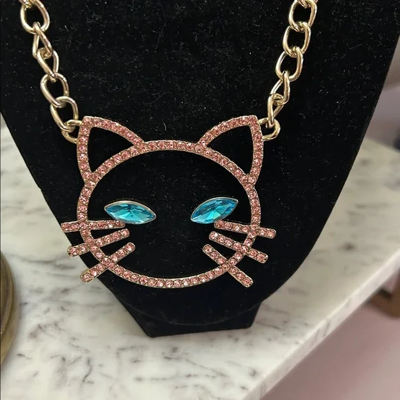 Betsey Johnson Gold-Tone Cat Face Necklace with Pink Crystals and Blue Eyes - Picture 3 of 3
